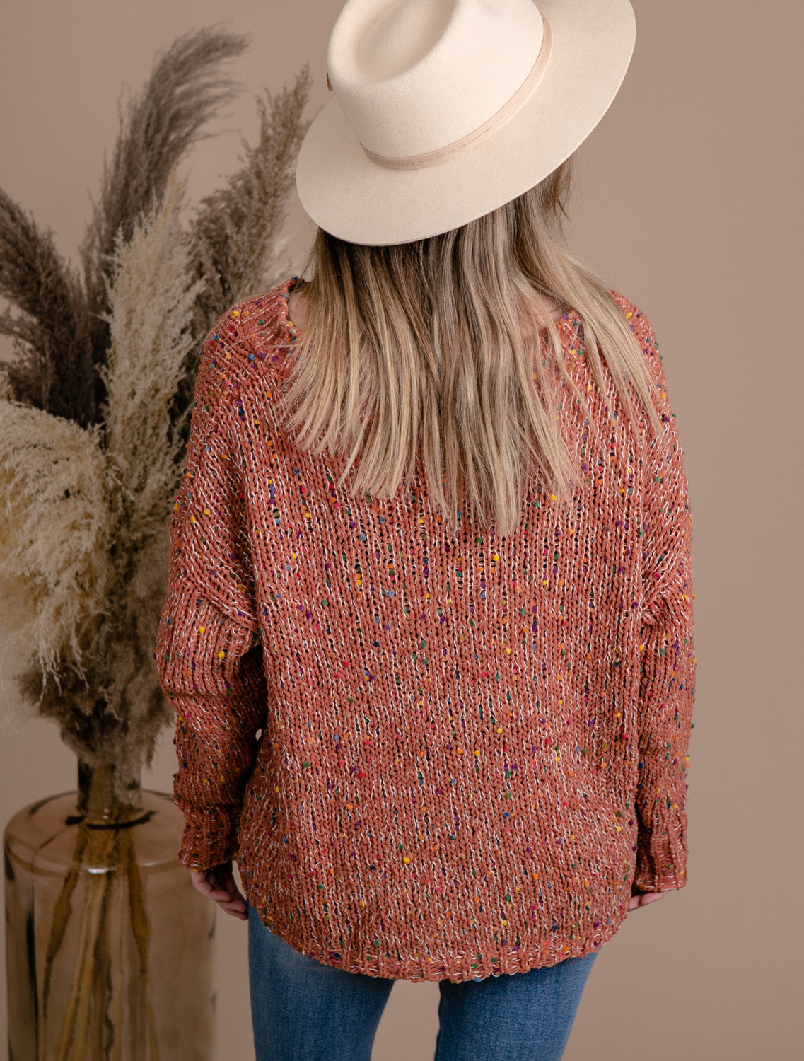 chunky knit vneck popcorn style sweater with coloured flecks throughout and drop sleeves
