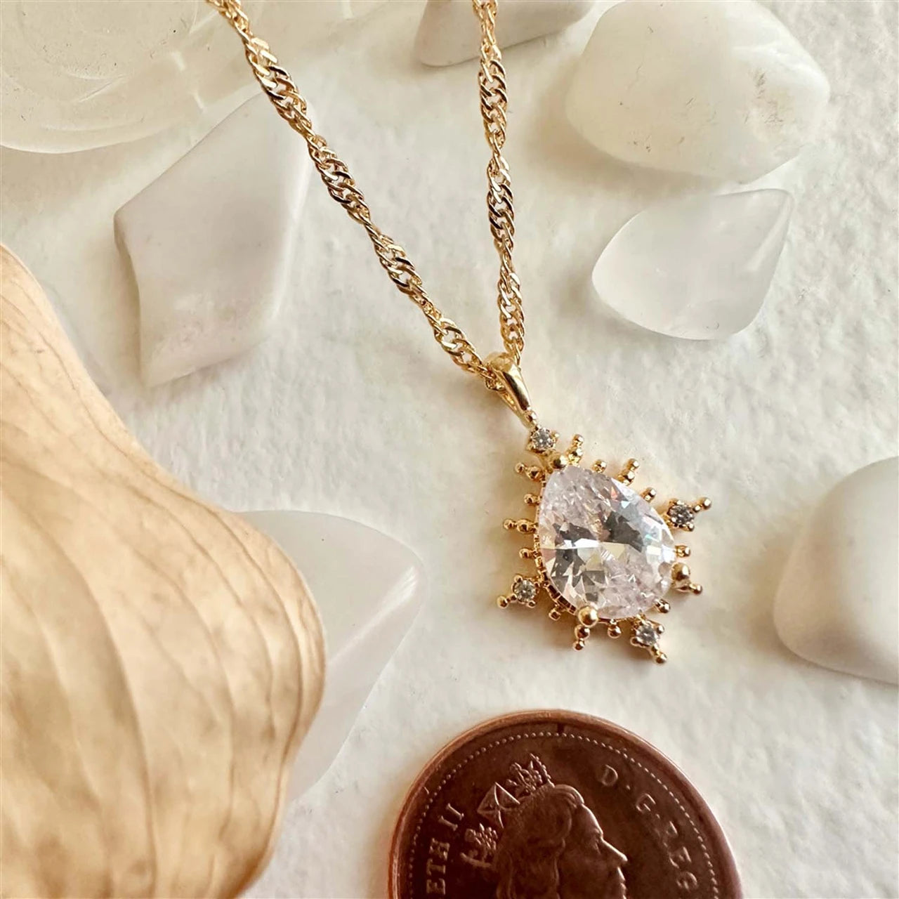 Cindel Teardrop Charm Necklace with Rhinestone Baguettes