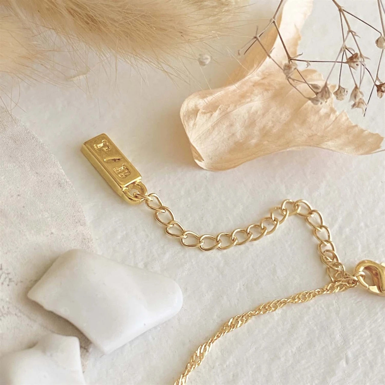 Cindel Teardrop Charm Necklace with Rhinestone Baguettes