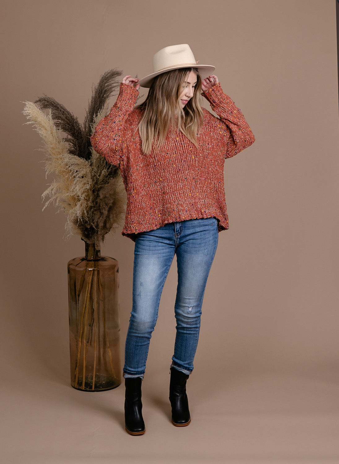 chunky knit vneck popcorn style sweater with coloured flecks throughout and drop sleeves